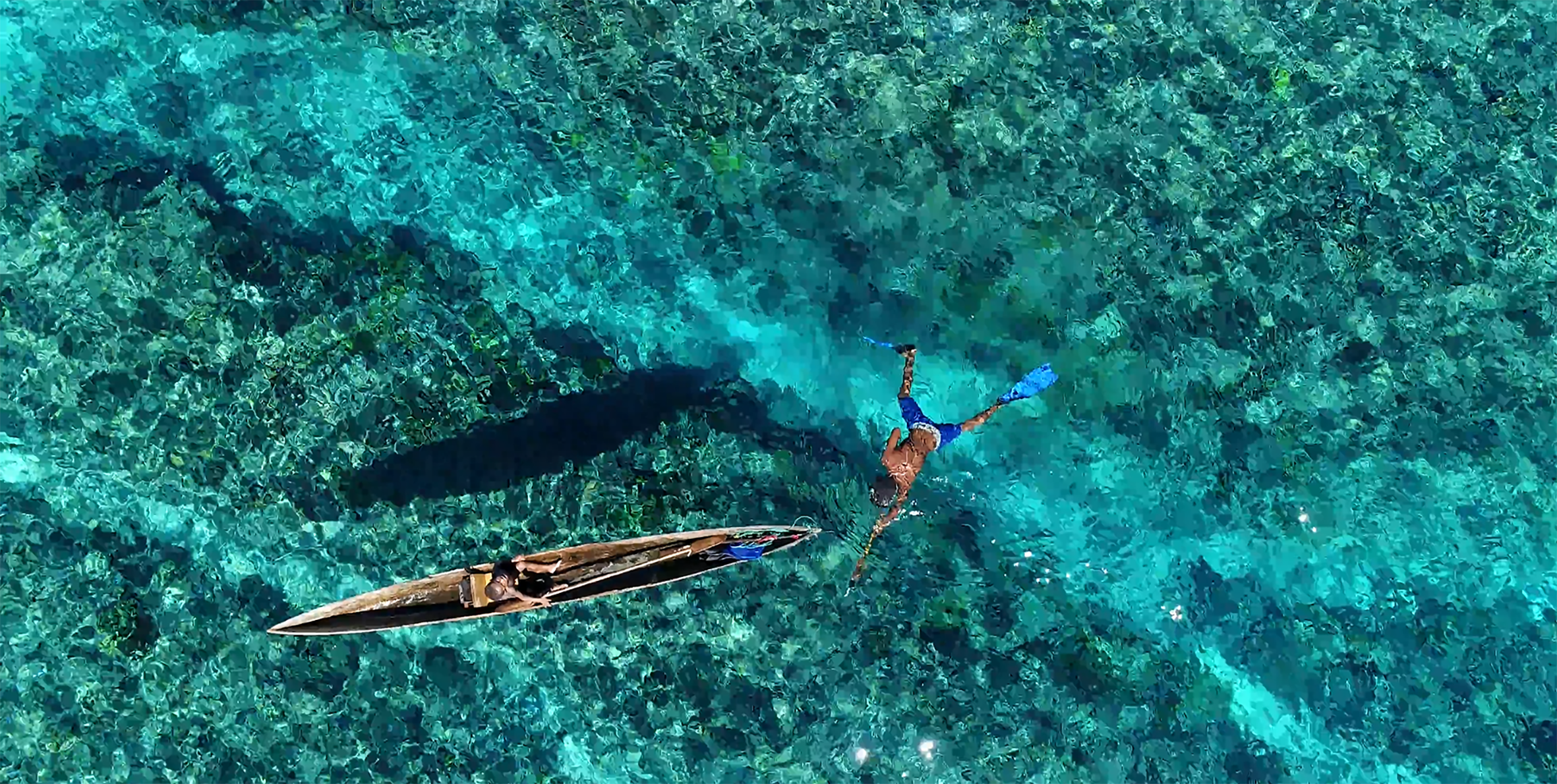 Fishers on a shallow reef in Ahus Island, Papua New Guinea. Photo: Dean Miller